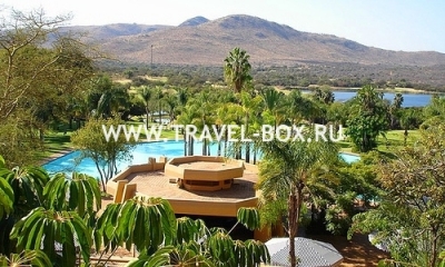 the sun city hotel, swimming pools and hillside view.jpg